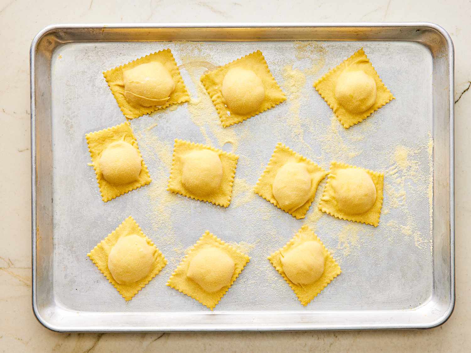 Ravioli on baking sheet