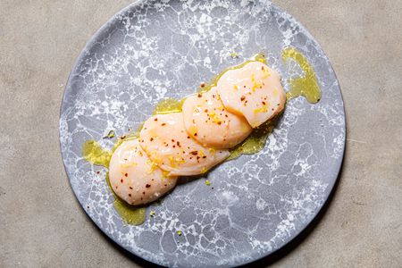 Overhead view of scallop crudo