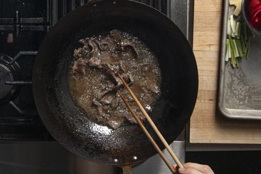 Overhead view of beef being dry-fried