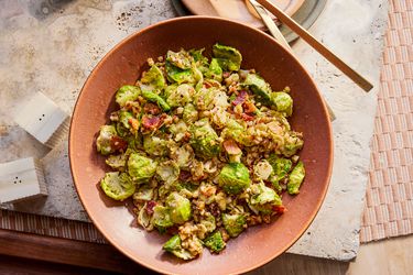 Overhead view of warm brussels sprouts salad on a Thanksgiving