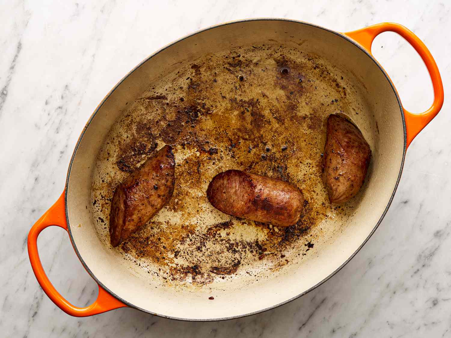 Sausages added to dutch oven