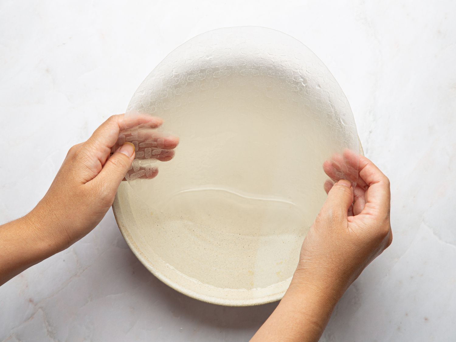 Overhead view of rehydrating rice paper