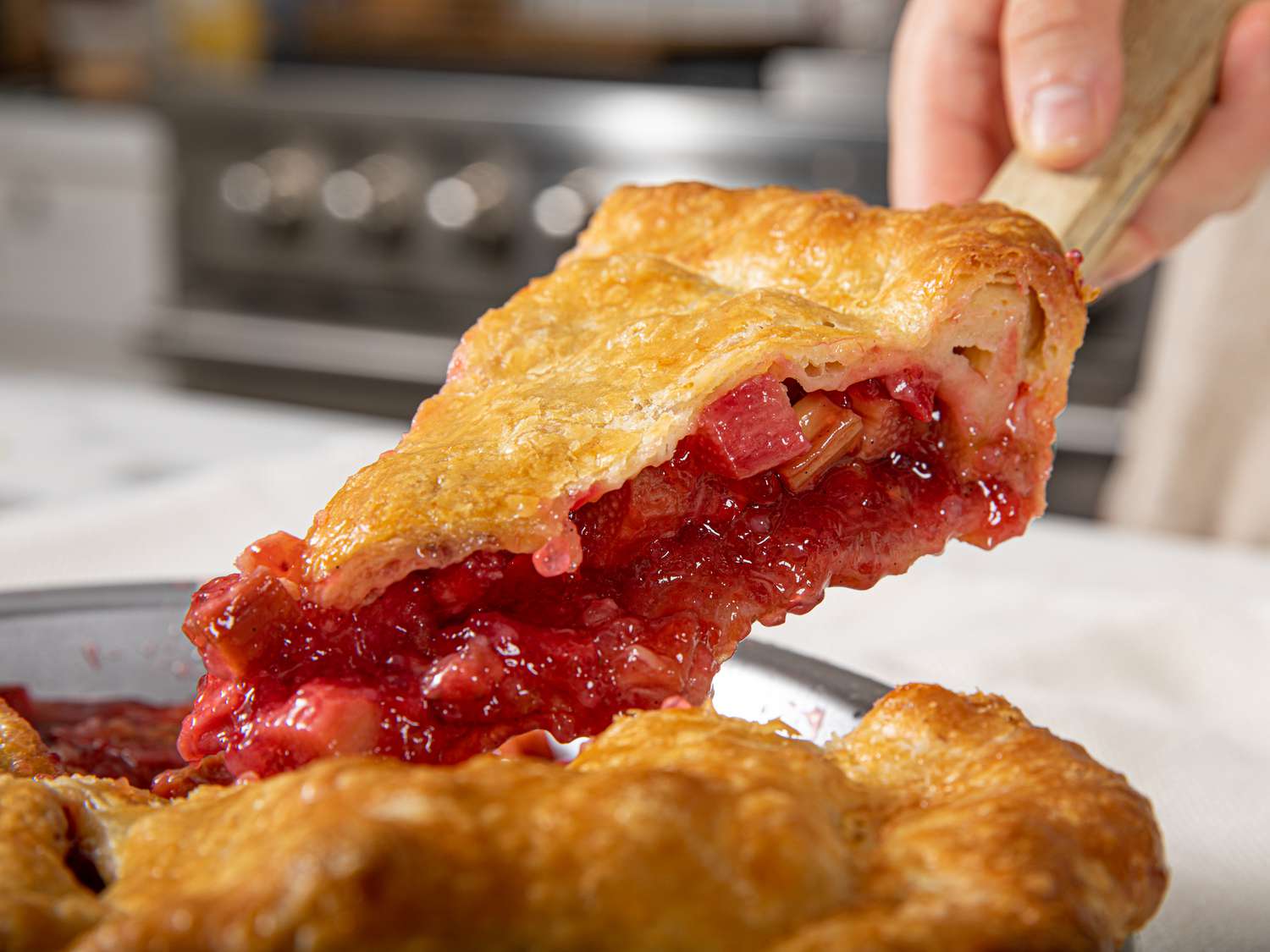 Slice of pie being lifted out of the pan