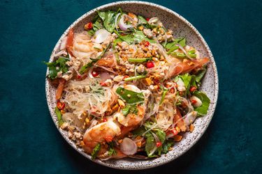 A serving bowl of yam woon sen with shrimp.