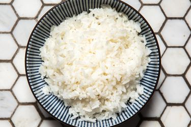 a top-down view of a bowl of white rice