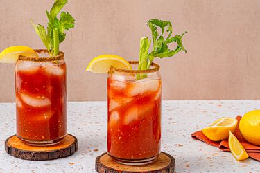 Two bloody marys one wooden costers