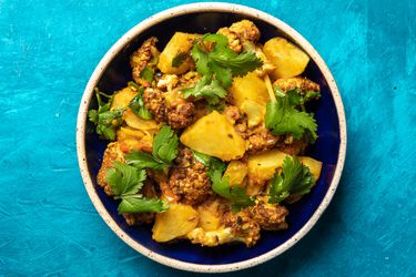 Overhead view of aloo gobi in a serving bowl