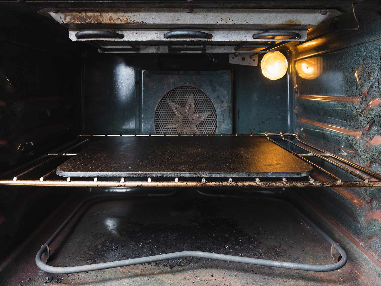 Baking steel preheating on lower-middle oven rack.