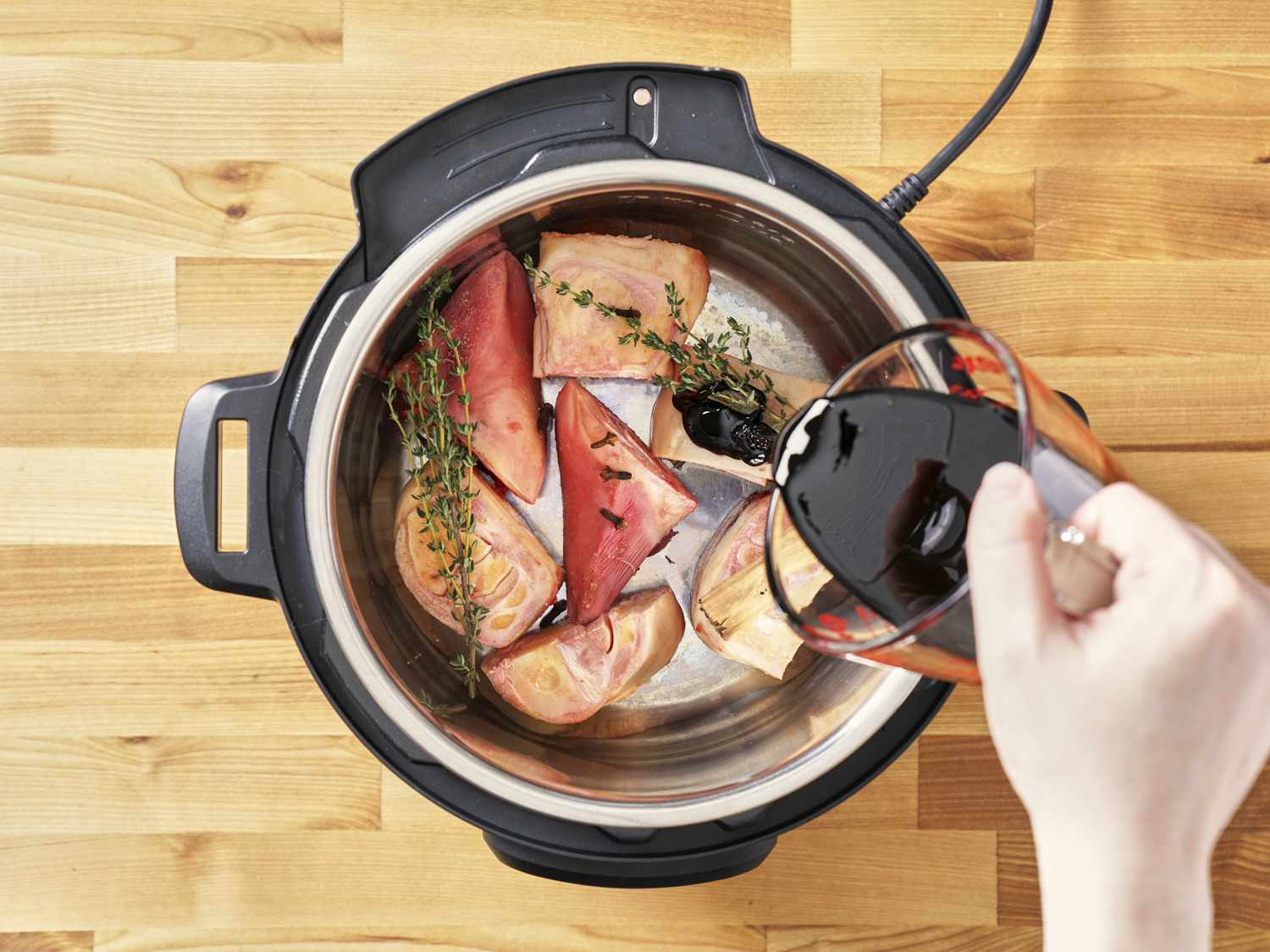 Cow feet in a pressure cooker.