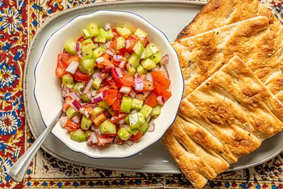 Overhead view of Shirazi salad with bread