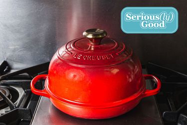 a red Le Creuset bread oven