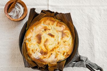 Overhead view of bibingka in cast iron pan