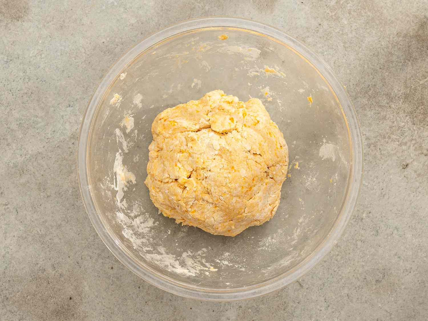 Overhead view of dough in bowl