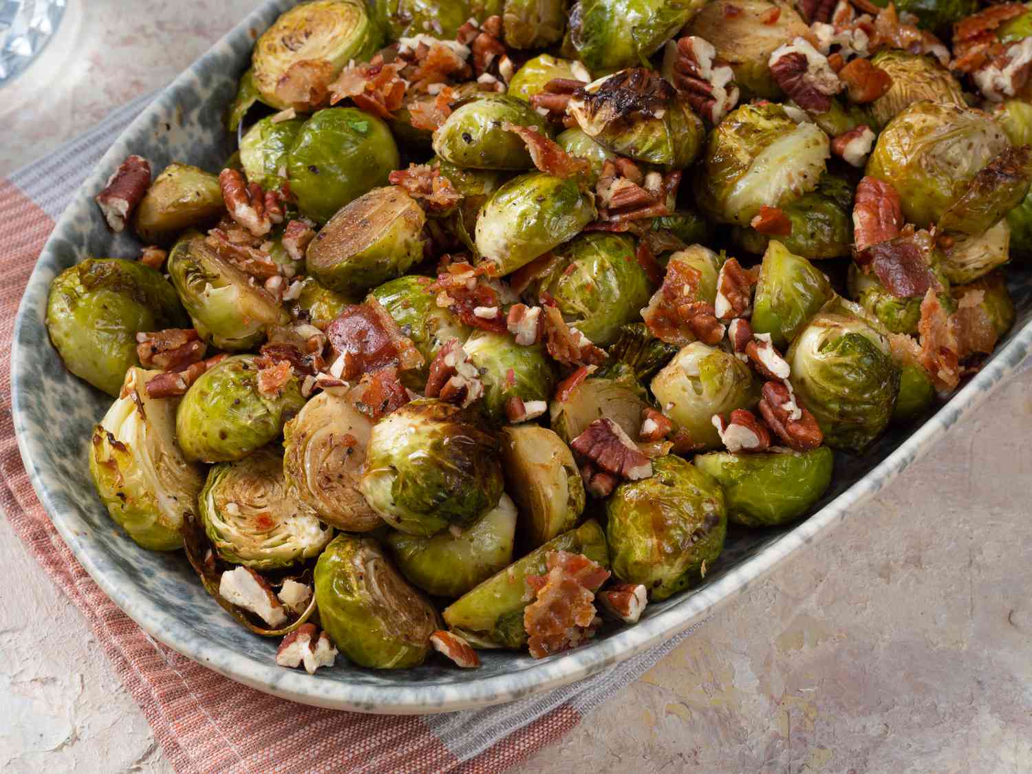 Finished brussels sprouts in a ceramic bowl.