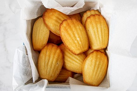 Overhead view of madeleines in box