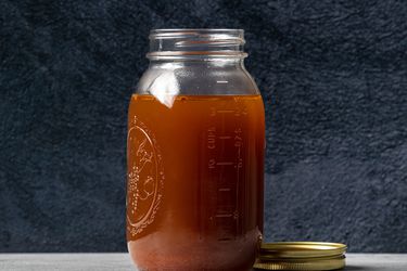 Pressure cooker beef stock in a jar