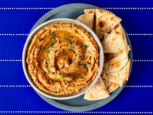 Overhead view of burnt eggplant and roasted red pepper dip