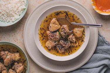 Nigerian pepper soup in a white bowl.