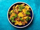 Overhead view of aloo gobi in a serving bowl