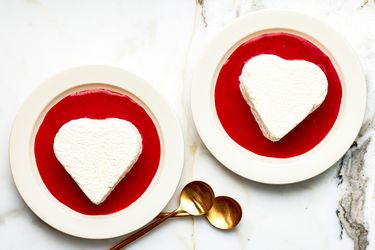 Overhead view of coeur al creme with strawberry sauce