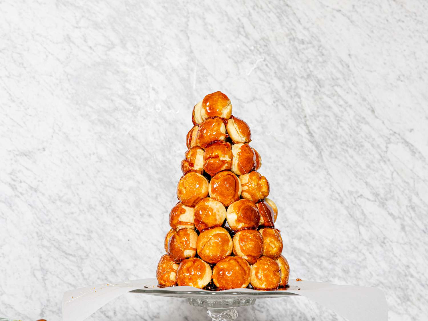 Partially built croquembouche