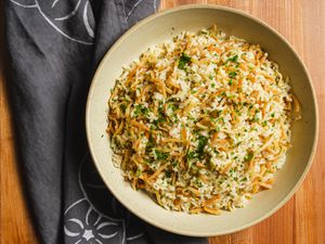 Overhead view of rice pilaf on a pale plate