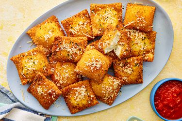 Overhead view of toasted ravioli on a plate