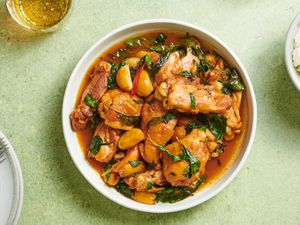 The three cup chicken in a white ceramic bowl.