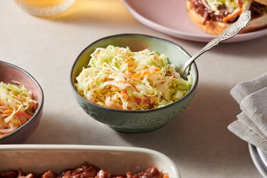 Vinegar coleslaw served inside a small bowl