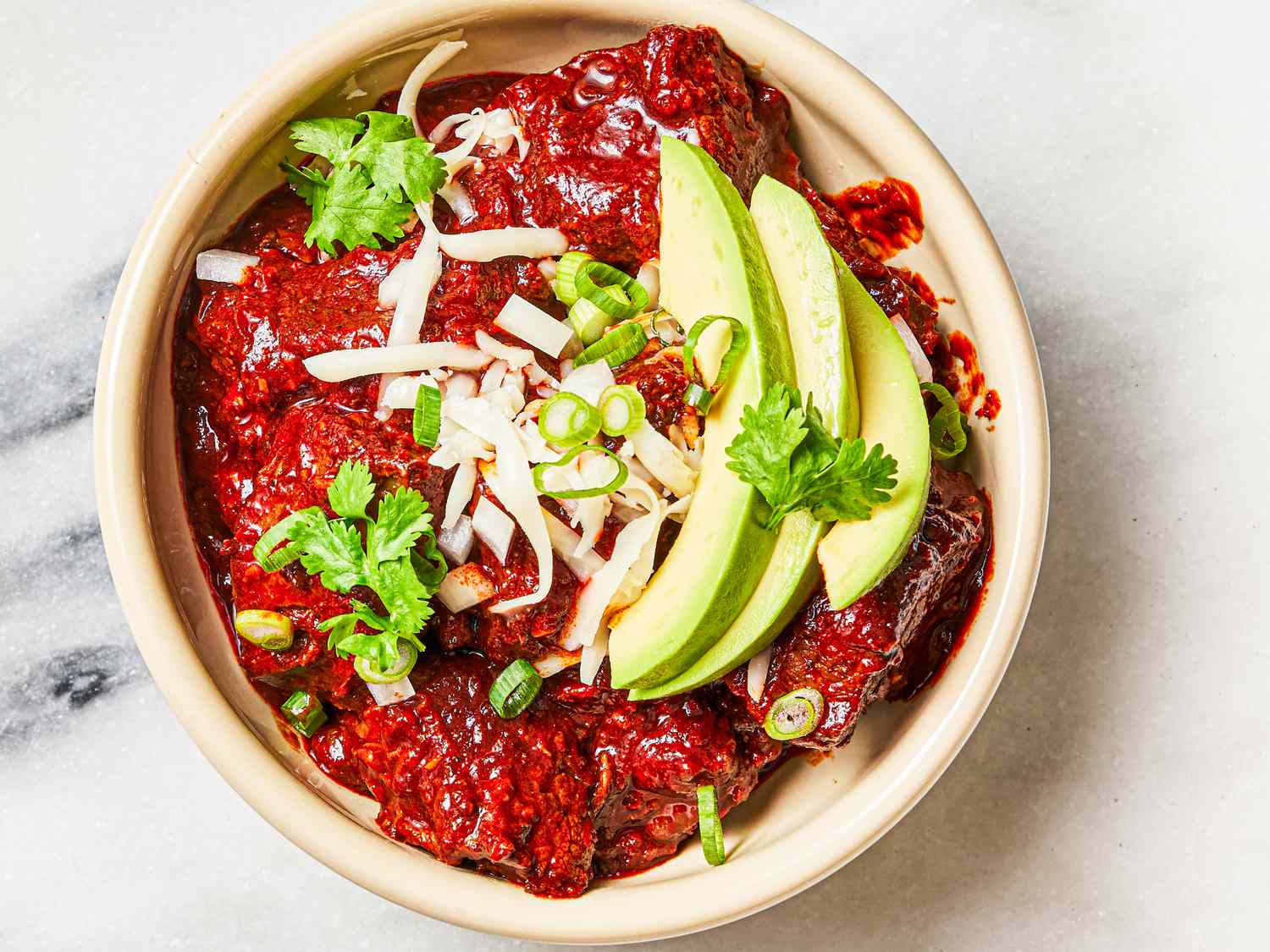 Overhead view of finished chili con carne in a bowl