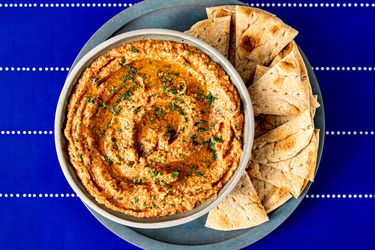 Overhead view of burnt eggplant and roasted red pepper dip